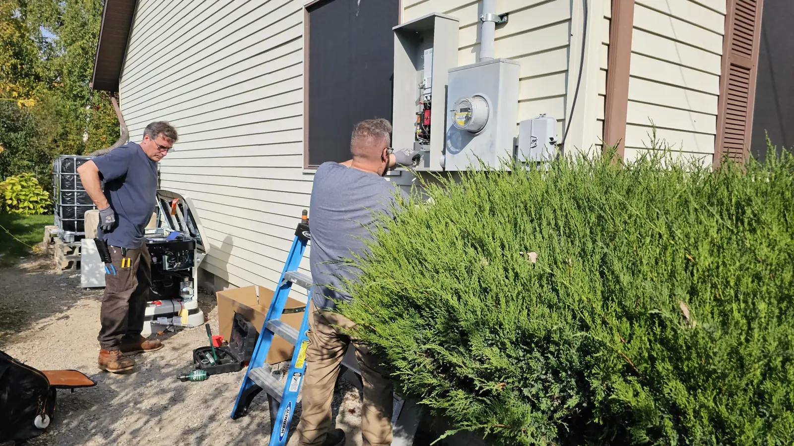 Axiom electricians replacing a residential electrical service